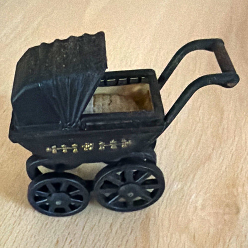Black plastic doll - plastic, pram